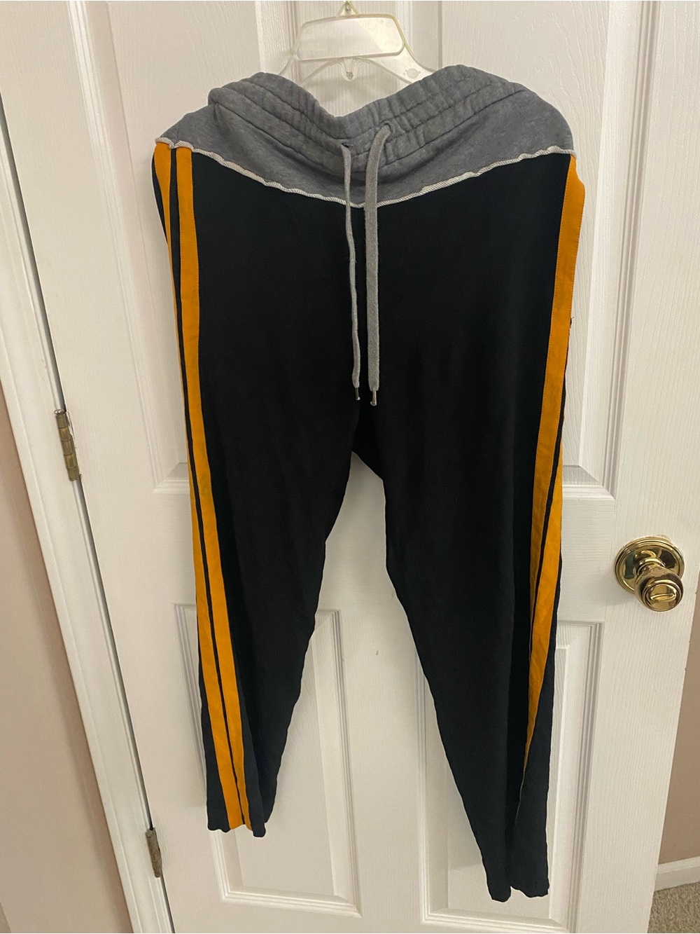 No 21 women’s Black Jogger Pants with Gold Side Stripes